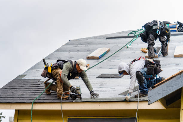 Professional Storm Damage Roof Repair technician working in Middlesex, NY